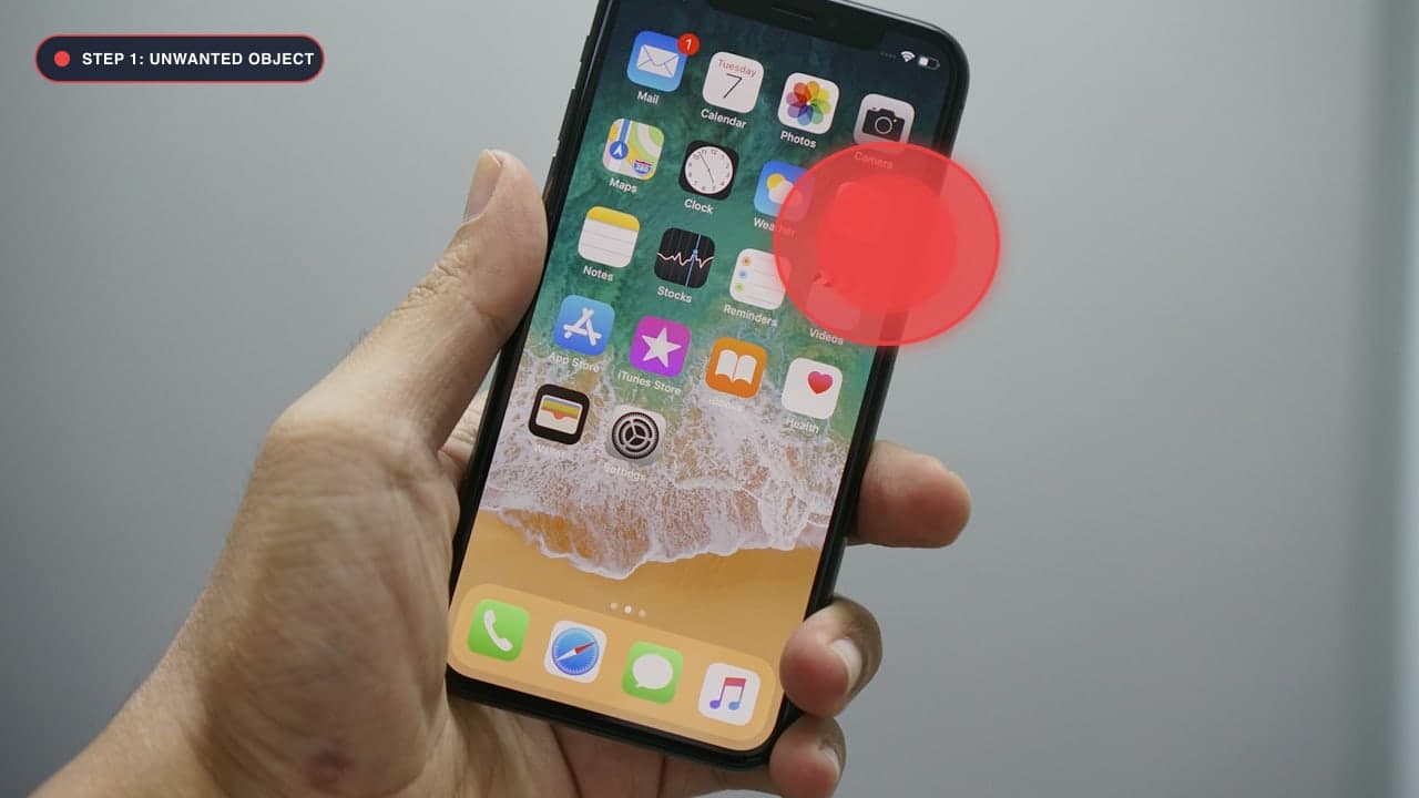 Selecting unwanted beach clutter on mobile Safari with touch controls.